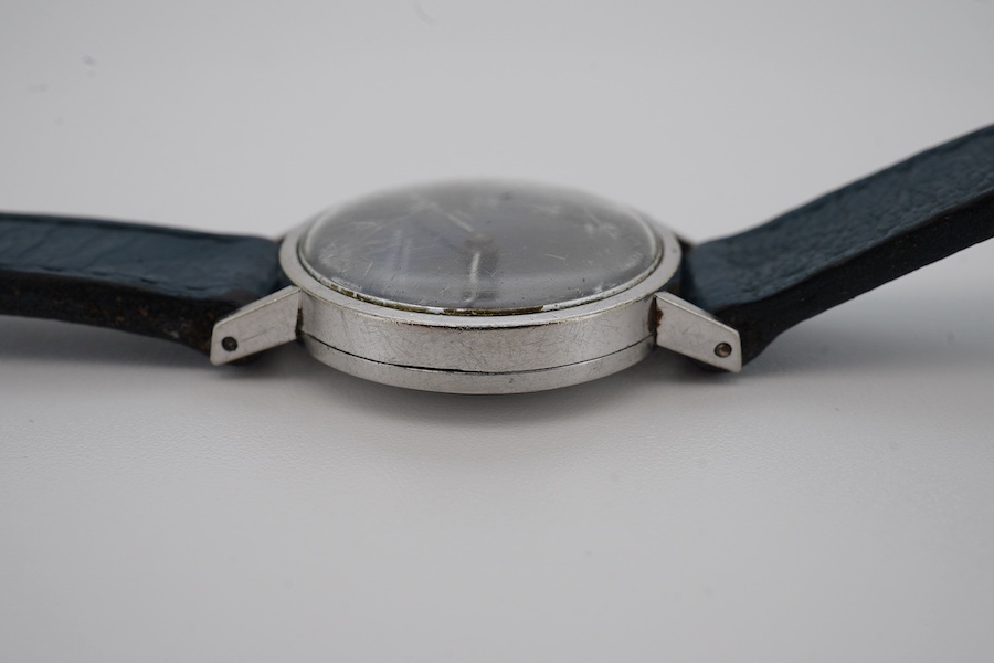 A lady's stainless steel Favre Leuba manual wind wrist watch, with lapis lazuli Arabic dial, case diameter 23mm, on an associated leather strap. Condition - fair